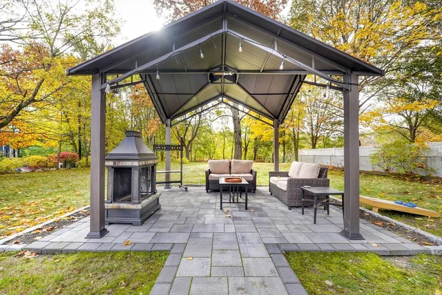 a view of outdoor space with deck and trees