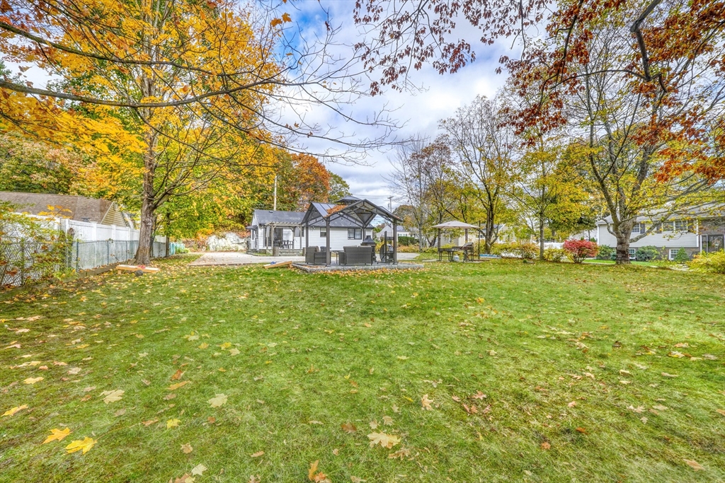 38 Appleton Street Saugus, MA 01906 - Photo 37 of 38 a view of yard with tree in the background