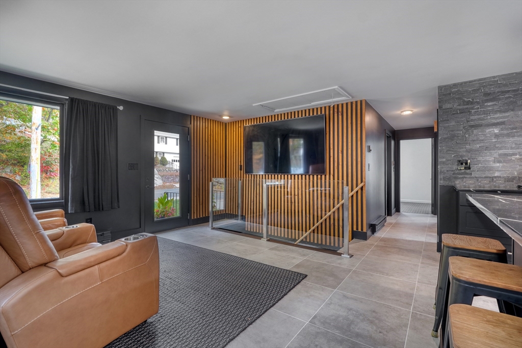 38 Appleton Street Saugus, MA 01906 - Photo 6 of 38 a living room with furniture and a flat screen tv