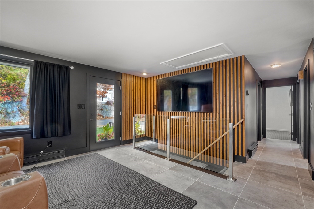38 Appleton Street Saugus, MA 01906 - Photo 10 of 38 a view of a livingroom with furniture and front door