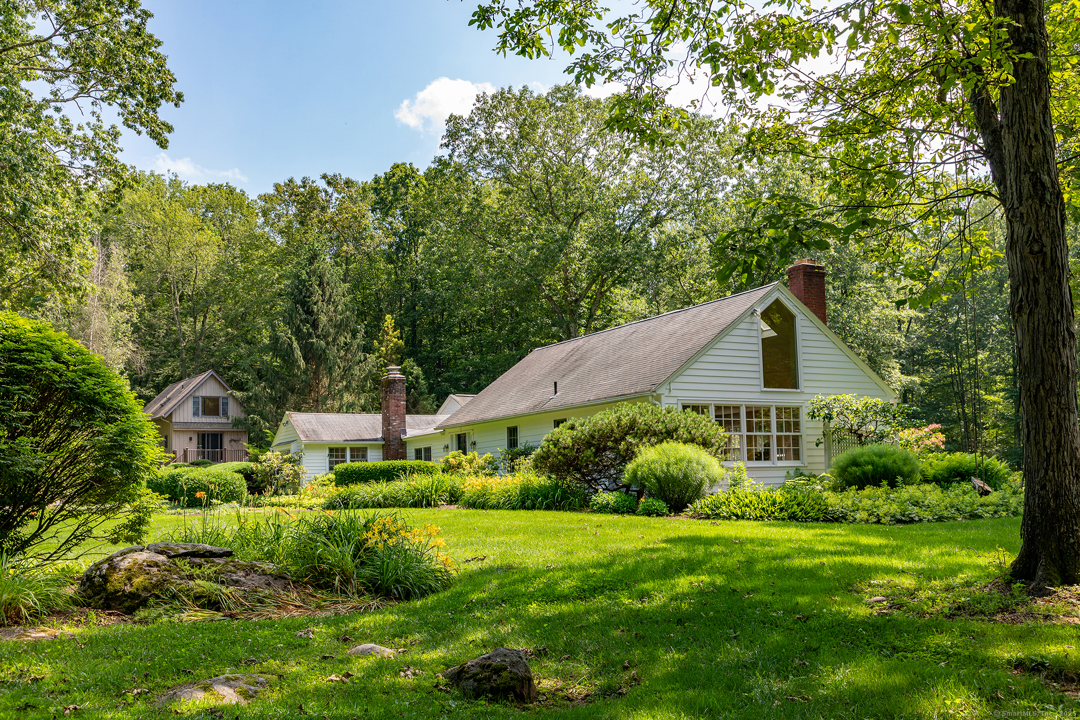 a house view with a garden space
