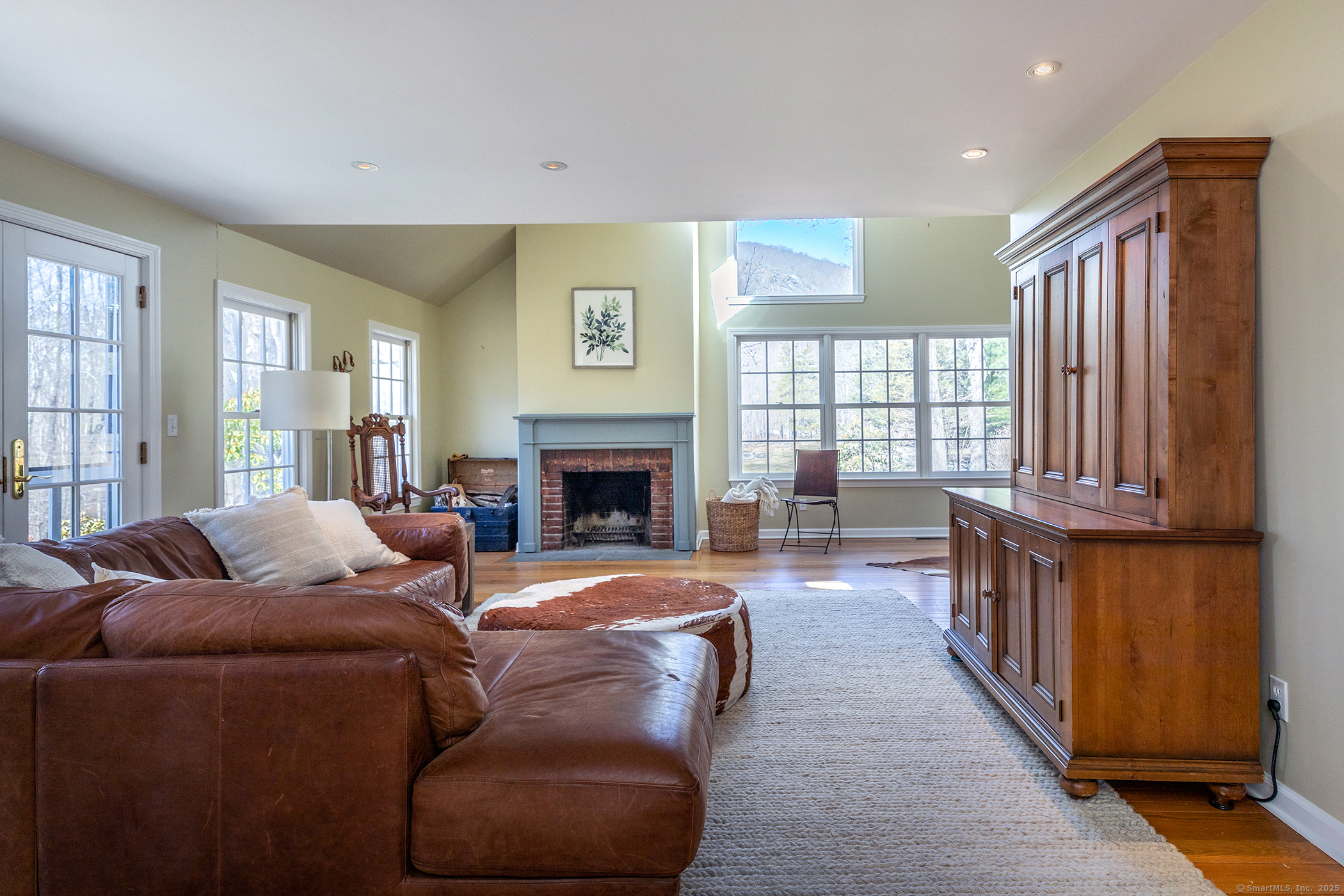 40 Camps Flat Road Kent, CT 06785 - Photo 14 of 26 a living room with furniture and a fireplace