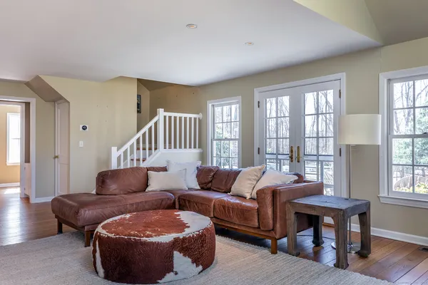 a living room with furniture and a window
