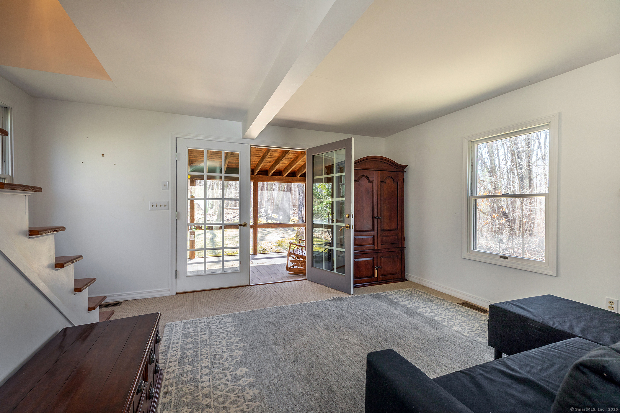 40 Camps Flat Road Kent, CT 06785 - Photo 25 of 26 a living room with furniture and a window