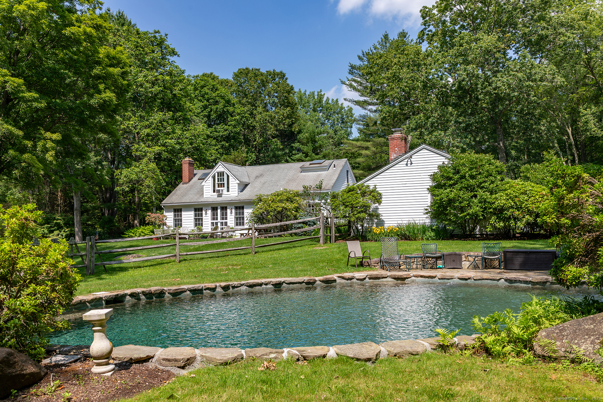 40 Camps Flat Road Kent, CT 06785 - Photo 9 of 26 a view of a house with a yard and a pond