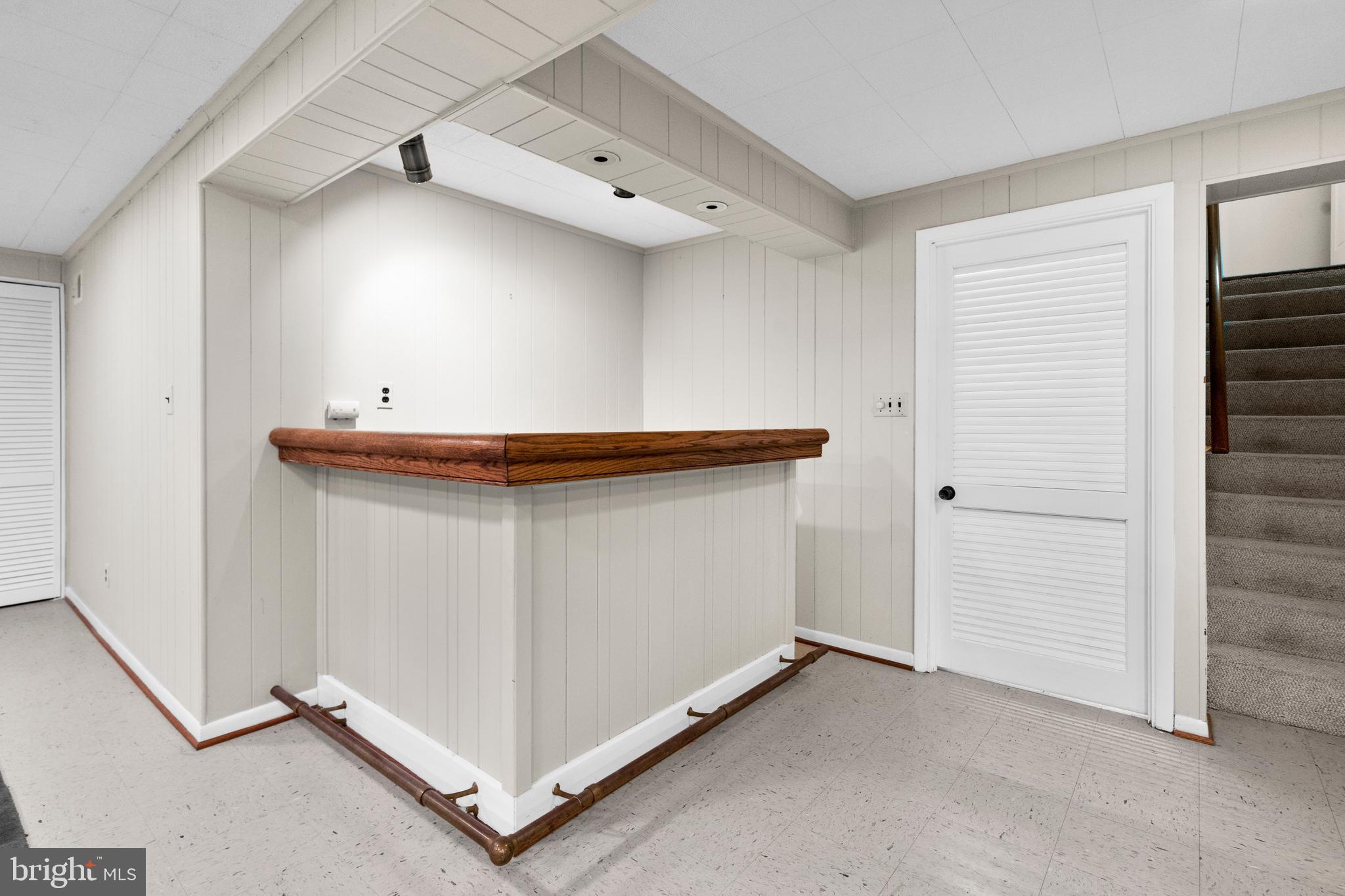 8808 Wooden Bridge Road Potomac, MD 20854 - Photo 43 of 53 Lower Level Recreation Room with dry Bar