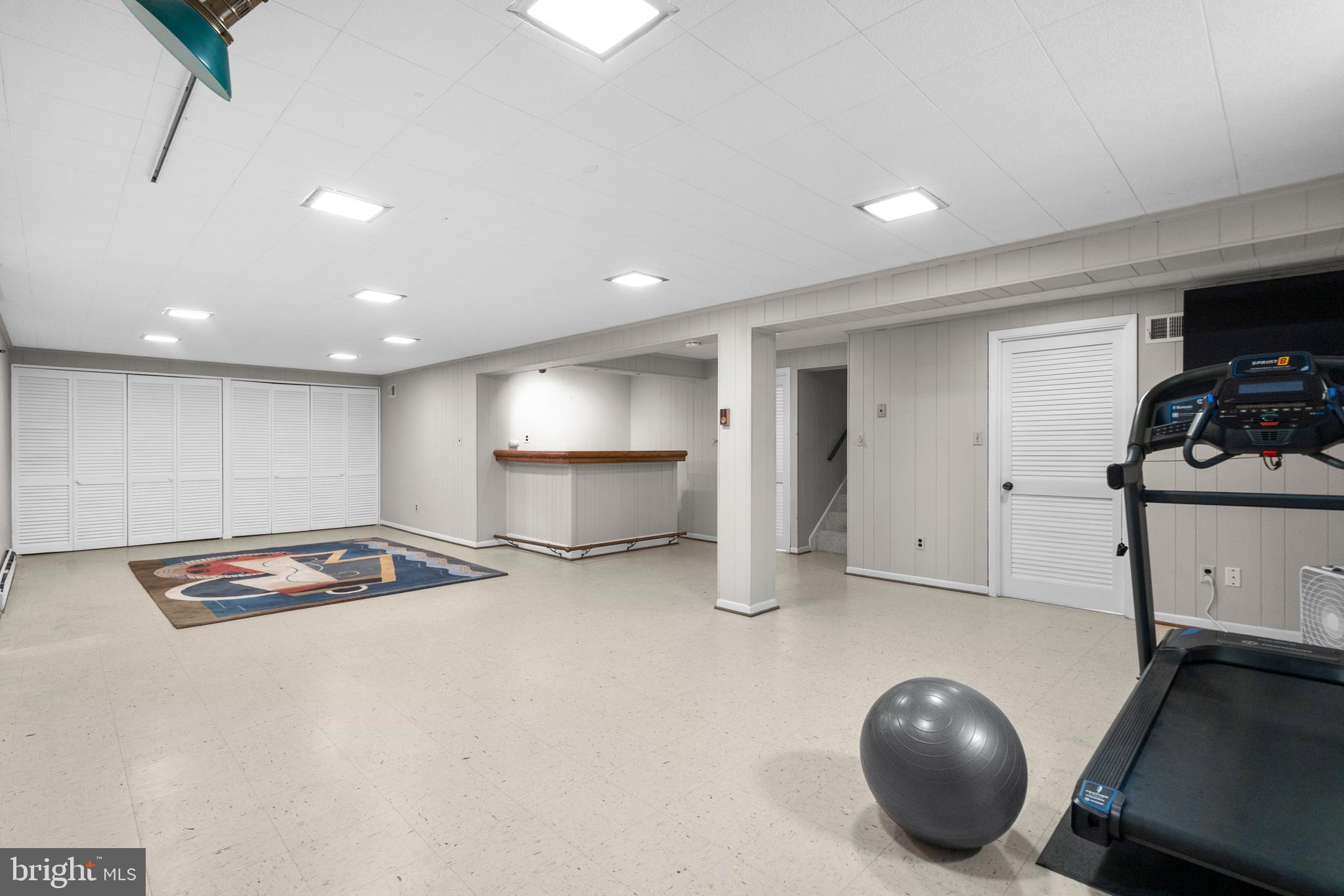 8808 Wooden Bridge Road Potomac, MD 20854 - Photo 44 of 53 Lower Level Recreation Room with dry Bar