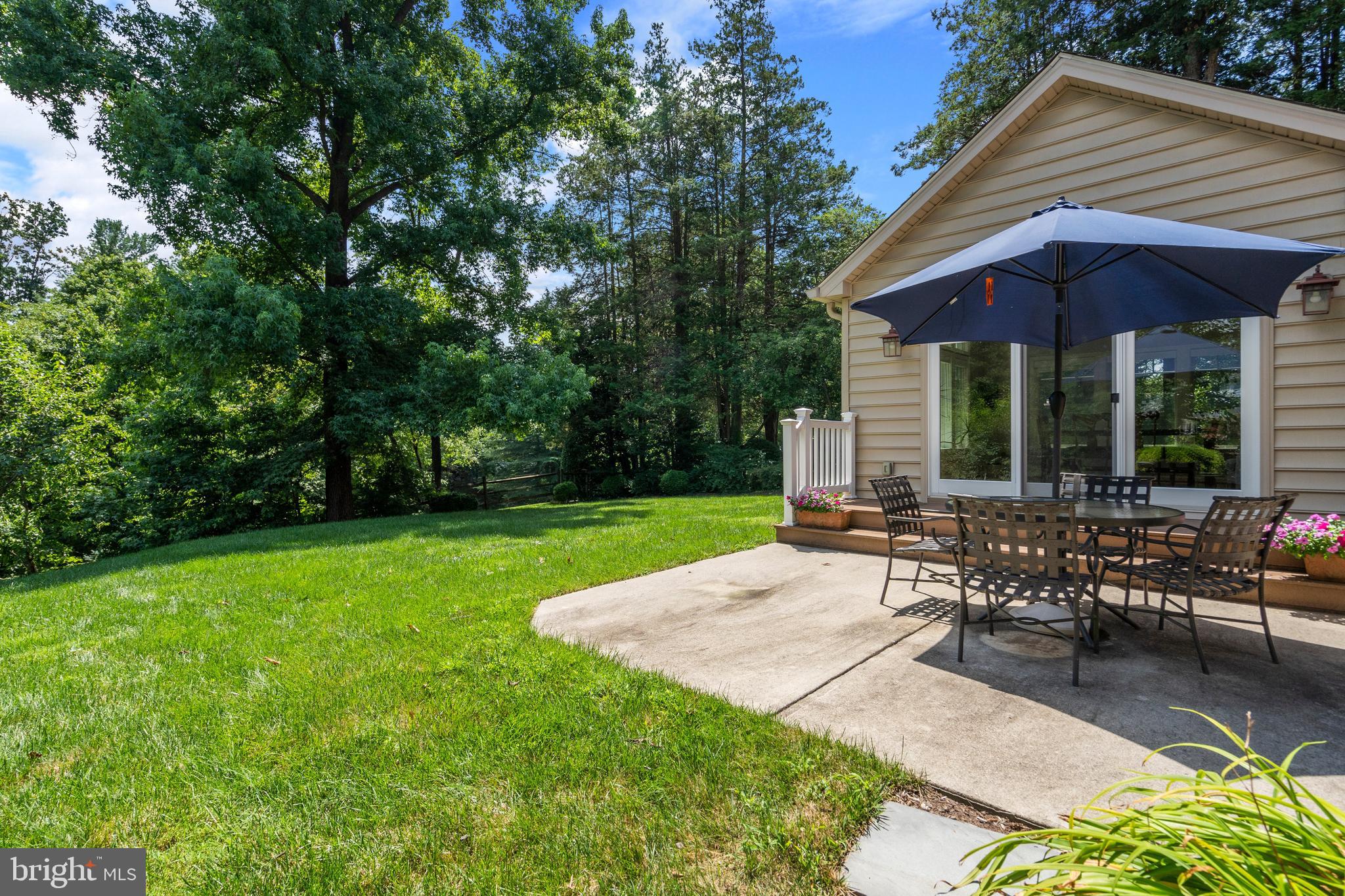 8808 Wooden Bridge Road Potomac, MD 20854 - Photo 49 of 53 Private Patio + Fenced Backyard