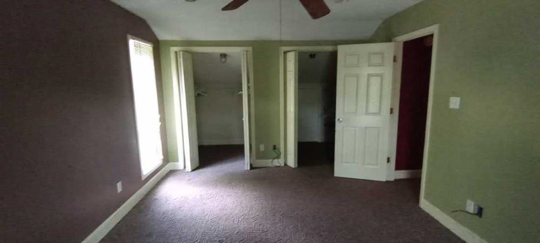 2600 Center Point Road South Reagan, TN 38368 - Photo 19 of 24 an empty room with windows and entrance