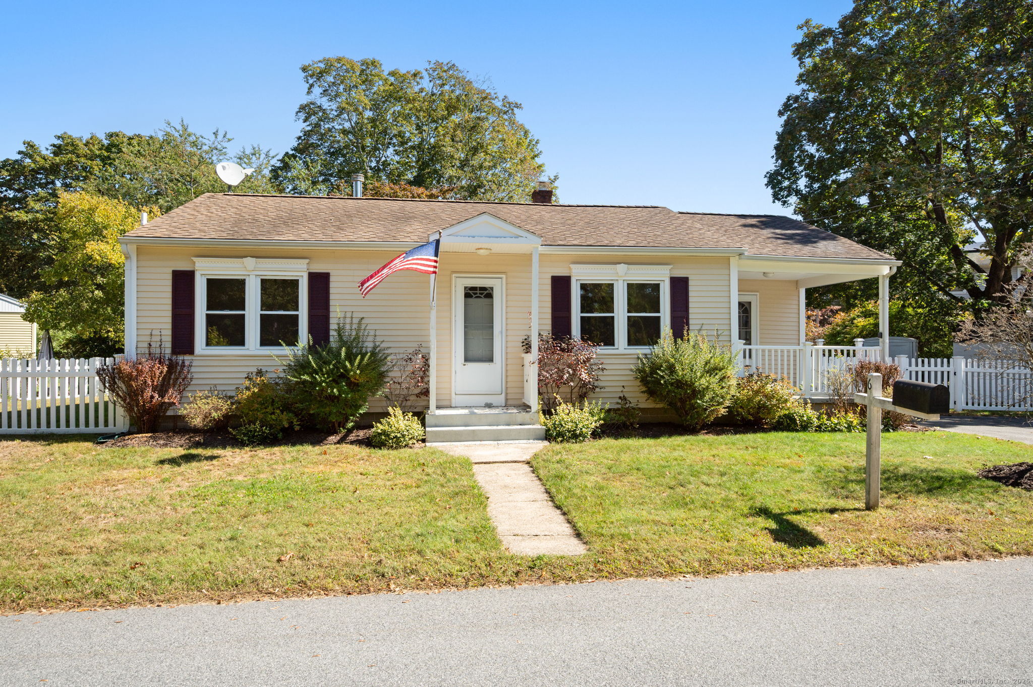 6 Sunset Road Gales Ferry, CT 06335 - Photo 3 of 23 a front view of a house with a yard