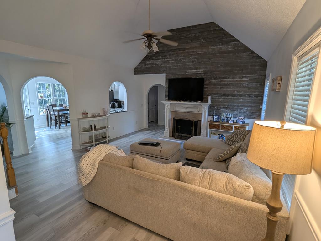 531 Philadelphia Drive Jasper, GA 30143 - Photo 30 of 43 a living room with furniture and a fireplace