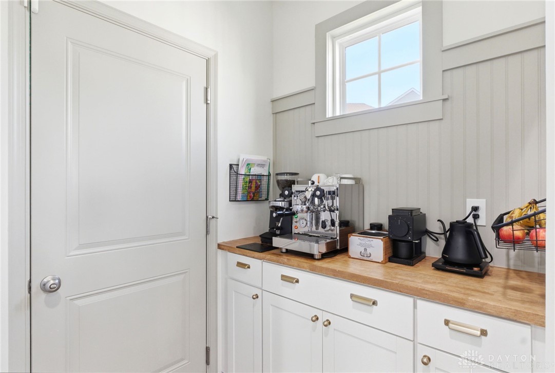 7900 Timberview Court Franklin, OH 45005 - Photo 21 of 60 This cozy utility area offers convenience with smart storage and natural light.