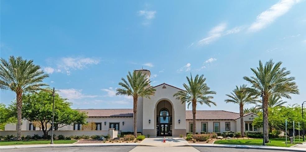 43885 Arancia Way Indio, CA 92203 - Photo 15 of 22 a front view of multiple houses with yard