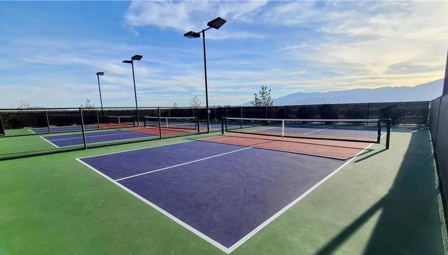 43885 Arancia Way Indio, CA 92203 - Photo 17 of 22 a view of a tennis court