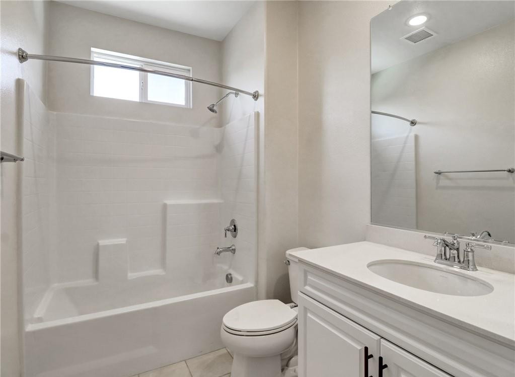 43885 Arancia Way Indio, CA 92203 - Photo 7 of 22 a bathroom with a sink toilet and shower