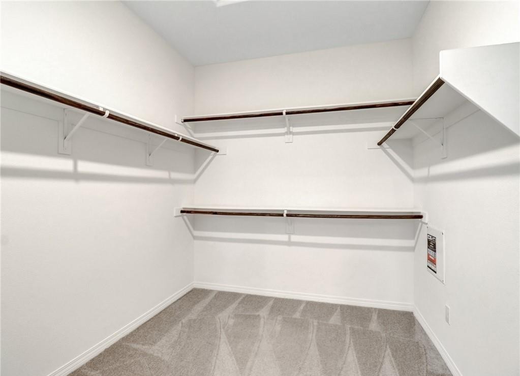 43885 Arancia Way Indio, CA 92203 - Photo 9 of 22 a view of an empty walk in closet