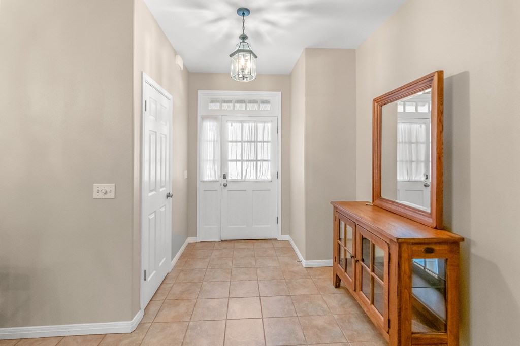 225 Los Cedros Loop Kerrville, TX 78028 - Photo 13 of 27 a view of a bedroom with windows