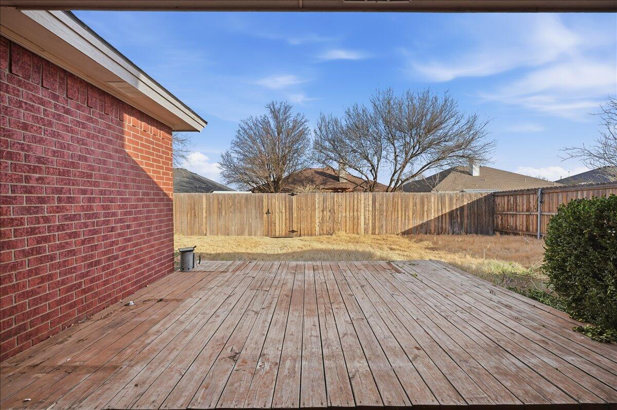 6214 6th Street Lubbock, TX 79416 - Photo 19 of 21 a view of a backyard of the house