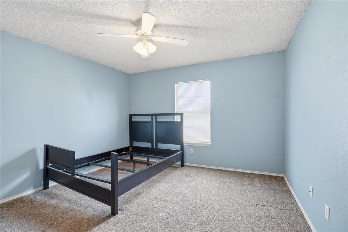 6214 6th Street Lubbock, TX 79416 - Photo 7 of 21 a living room with furniture