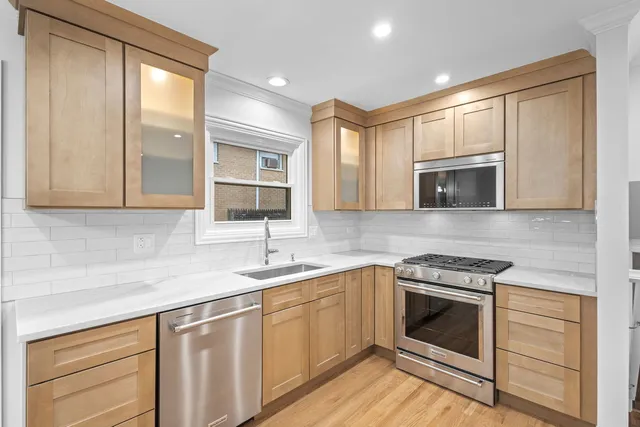 a view of a kitchen from the hallway