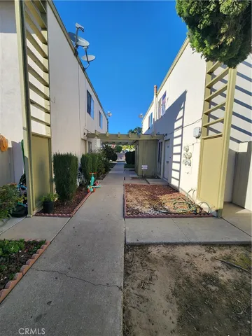 a view of a house with a street