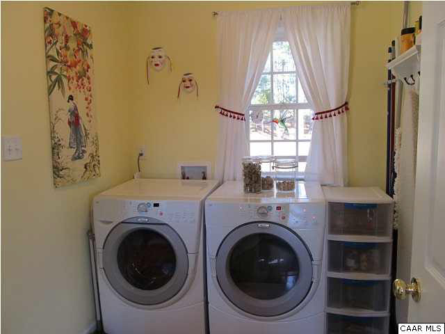 448 Rockfish Run Road Scottsville, VA 24590 - Photo 17 of 27 a utility room with dryer and washer