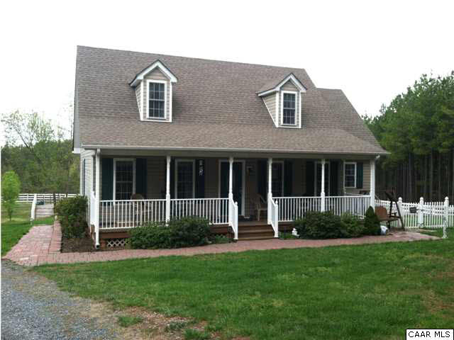 448 Rockfish Run Road Scottsville, VA 24590 - Photo 2 of 27 a front view of a house with a yard