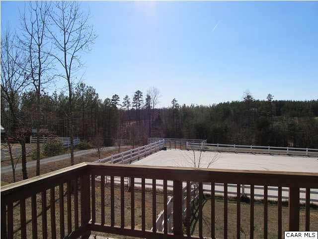 448 Rockfish Run Road Scottsville, VA 24590 - Photo 24 of 27 a view of a roof deck with wooden floor and fence