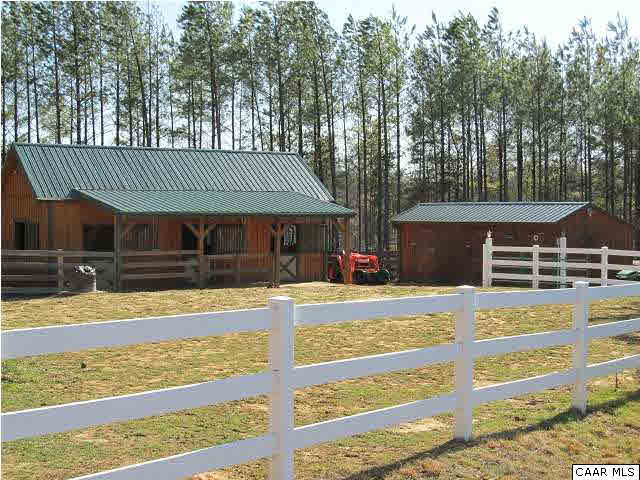 448 Rockfish Run Road Scottsville, VA 24590 - Photo 4 of 27 a front view of a house with a yard