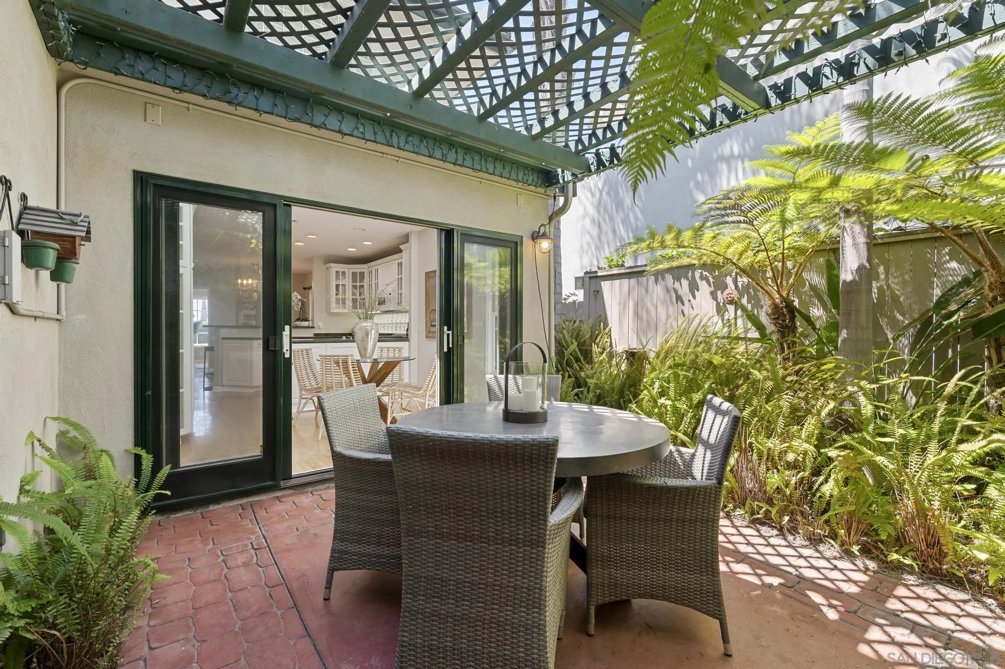7231 Draper Avenue La Jolla, CA 92037 - Photo 12 of 26 a dining room with furniture and window