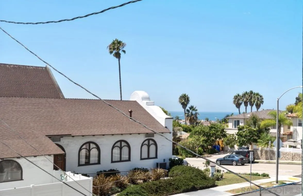 7231 Draper Avenue La Jolla, CA 92037 - Photo 15 of 26 a front view of a house with garden