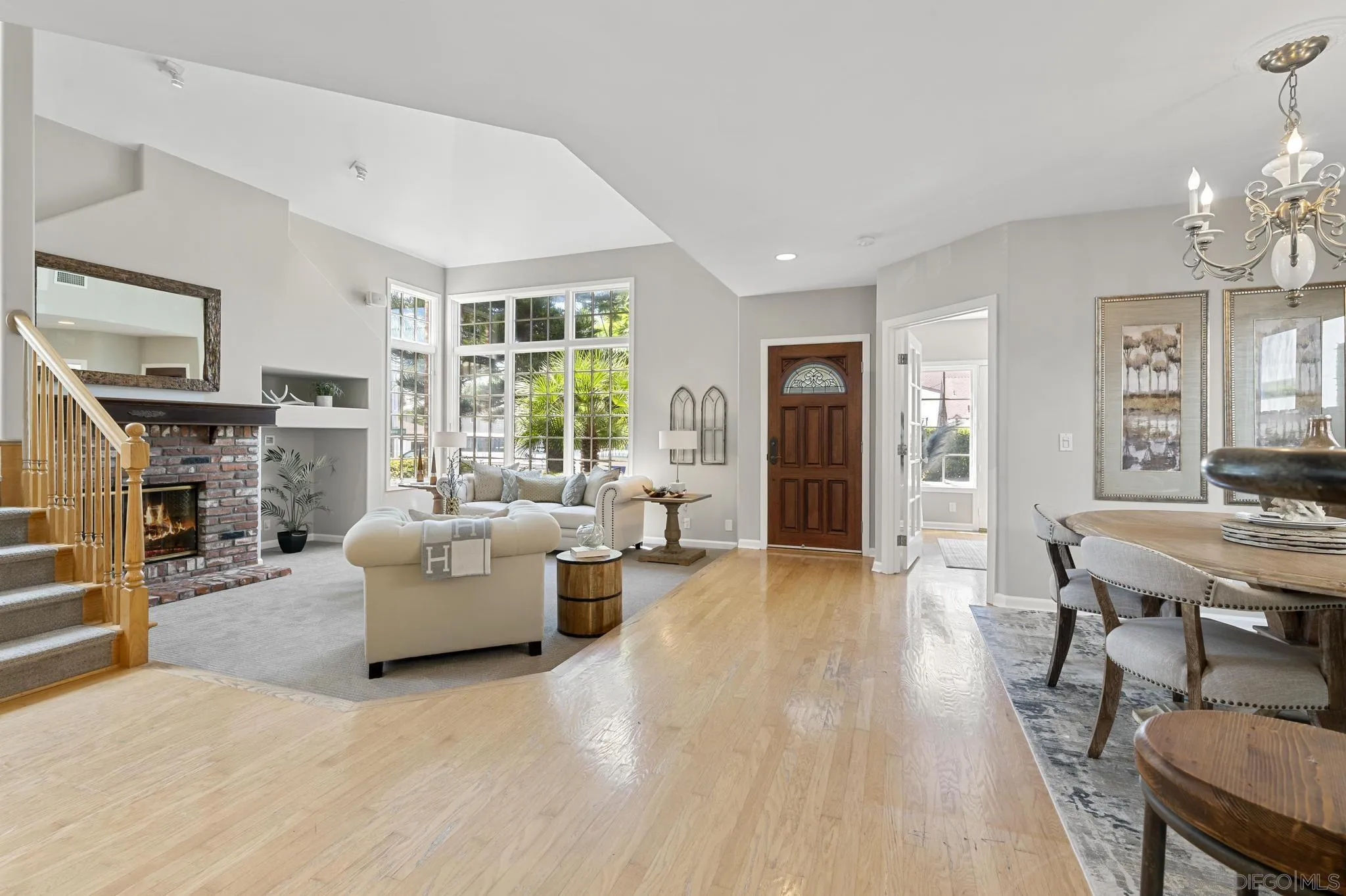 7231 Draper Avenue La Jolla, CA 92037 - Photo 5 of 26 a living room with fireplace furniture and a large window