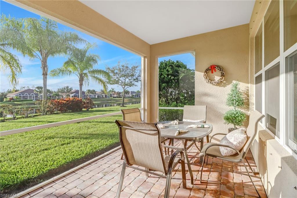 8416 Benelli Court Naples, FL 34114 - Photo 12 of 12 a view of an chairs and table in the patio