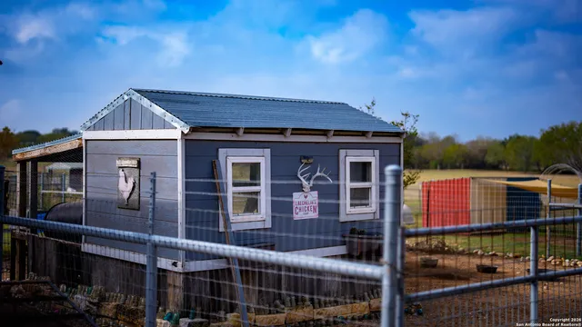 a front view of a building with glass windows