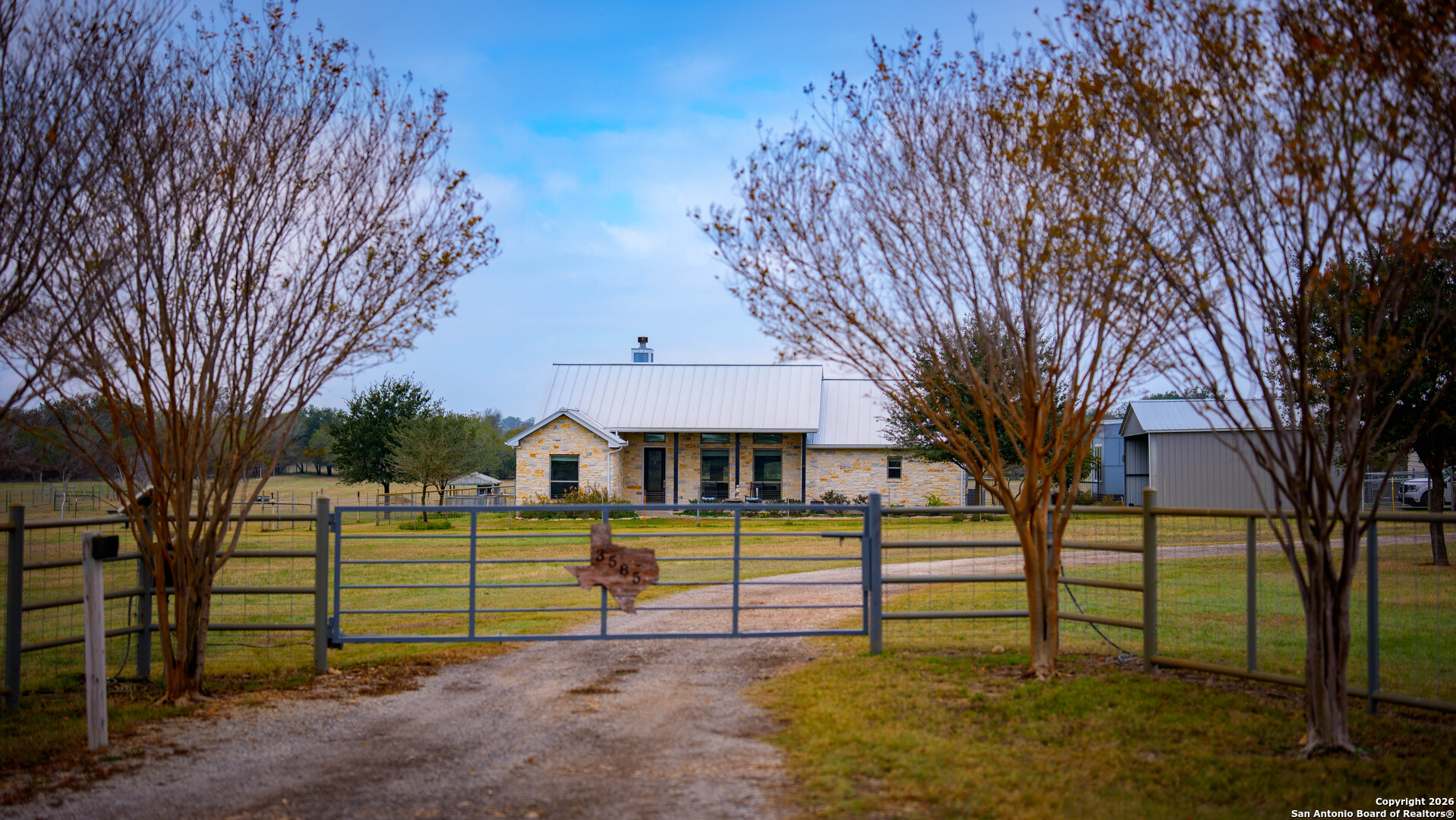 3585 Pittman Road St. Hedwig, TX 78152 - Photo 26 of 36 a view of a house with a yard