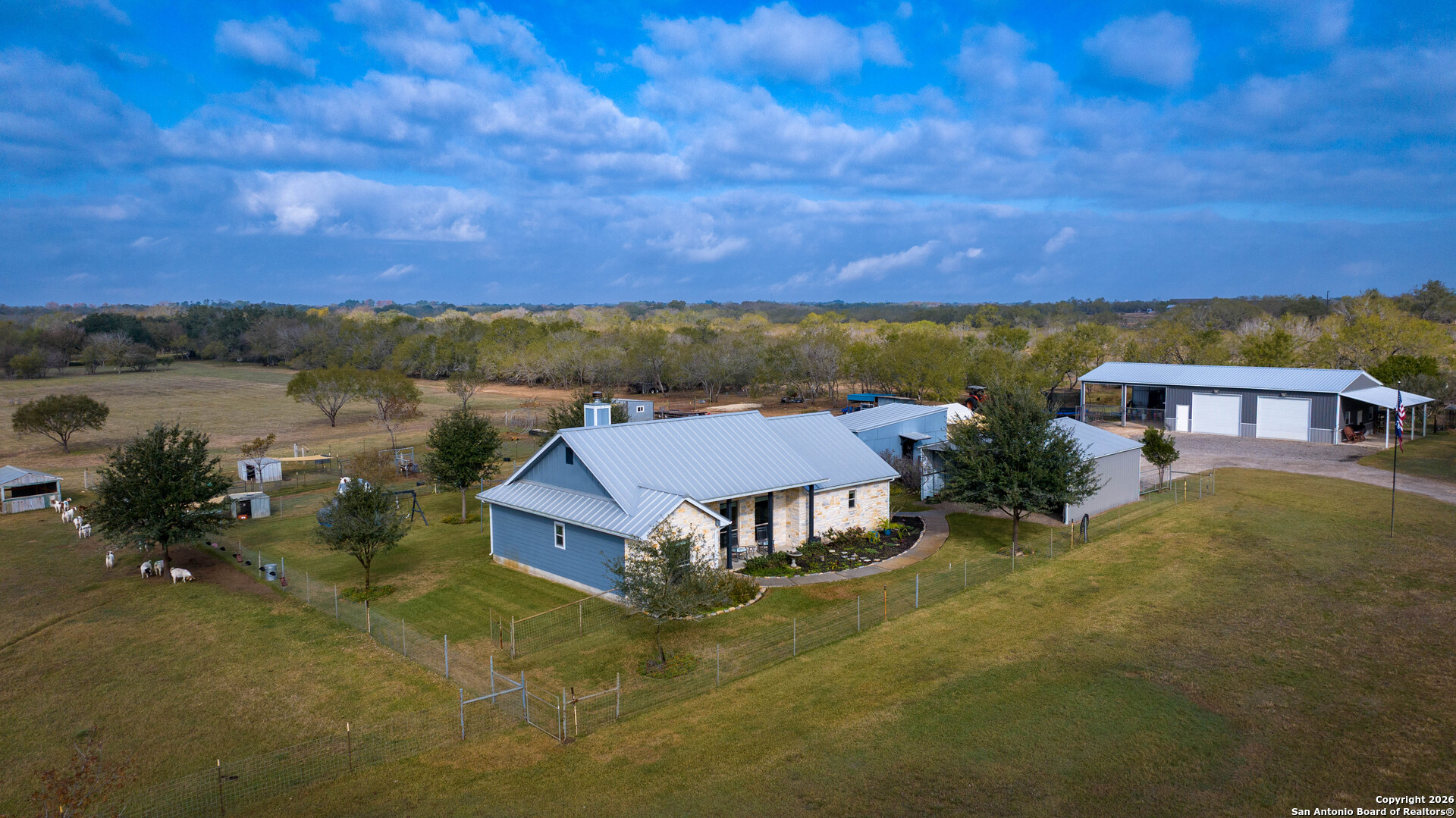 3585 Pittman Road St. Hedwig, TX 78152 - Photo 27 of 36 a view of a big house with a mountain in the background