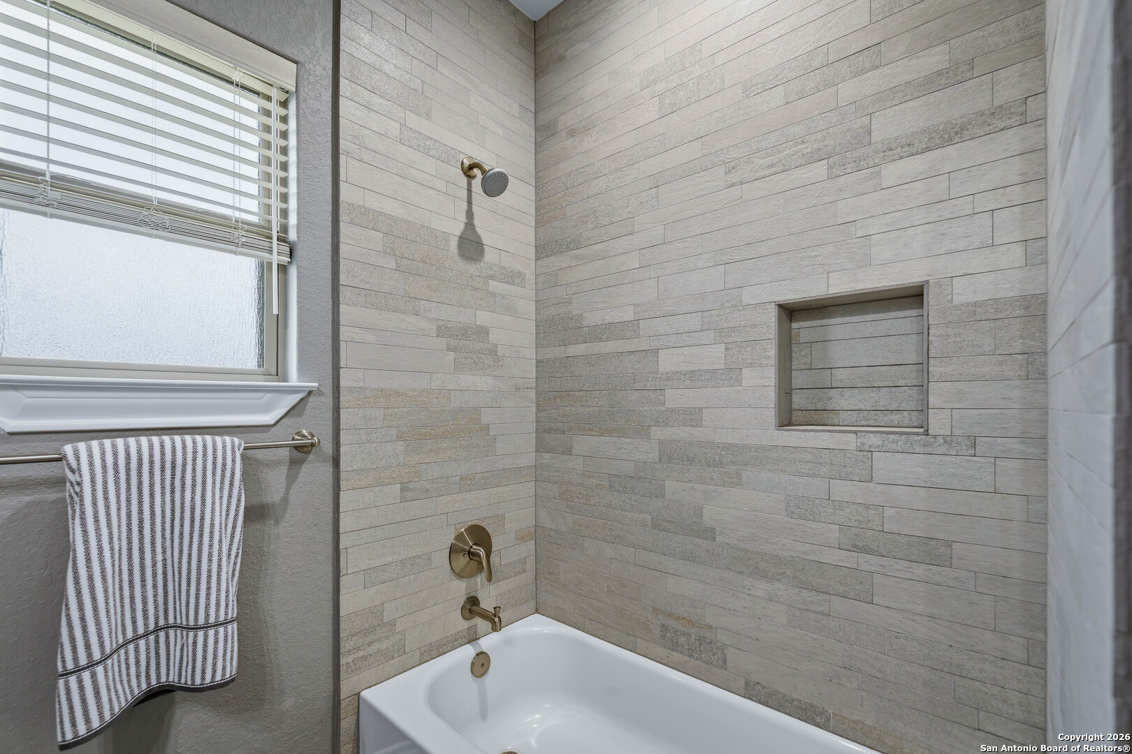 3585 Pittman Road St. Hedwig, TX 78152 - Photo 35 of 36 a bathroom with a sink and shower