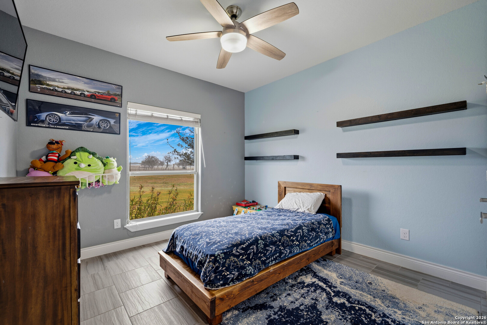 3585 Pittman Road St. Hedwig, TX 78152 - Photo 10 of 36 a bedroom with a bed and a window