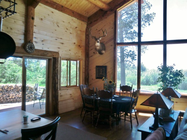 44291 90 Road Nucla, CO 81424 - Photo 17 of 25 a view of a dining room with furniture window and outside view