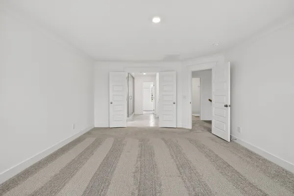 a spacious bathroom with a double vanity sink mirror and double