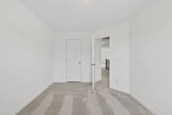 a house that has a big yard in front of it