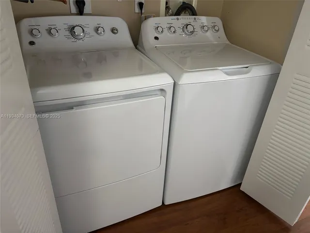 a utility room with dryer and washer