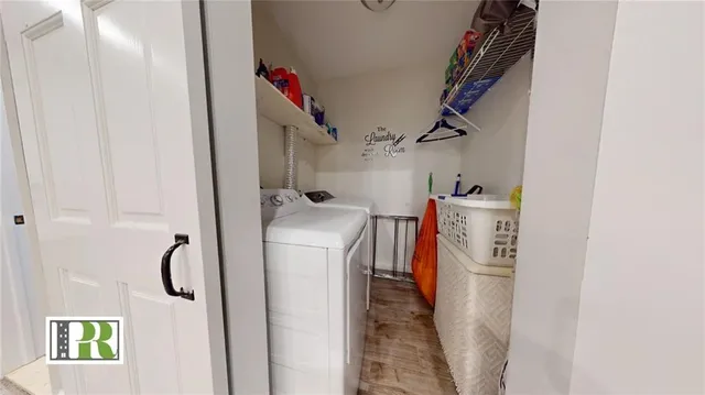 a utility room with dryer and washer