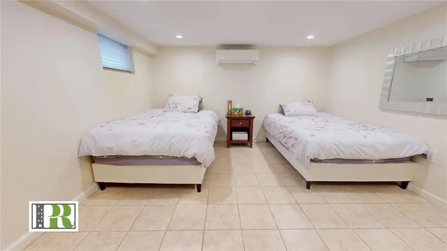 a bedroom with a bed and a walk in closet