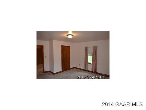 216 Cricket Road Staunton, VA 24401 - Photo 9 of 36 a picture of a room with a white wall and window