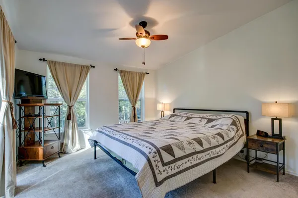 a view of swimming pool with trees