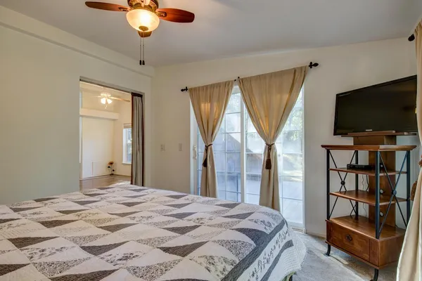 a view of a swimming pool with a yard