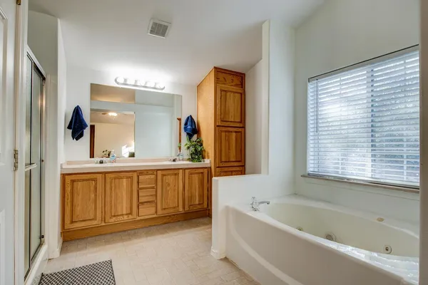 a view of backyard with tree