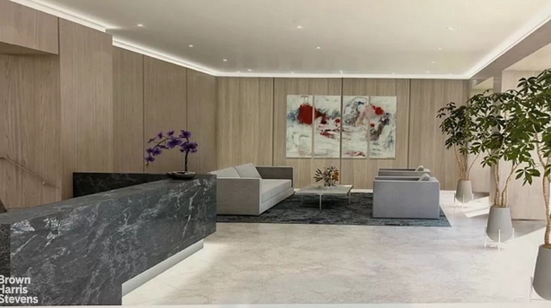 305 East 40th Street, Unit 4J Manhattan, NY 10016 - Photo 15 of 17 a living room with furniture and flowers