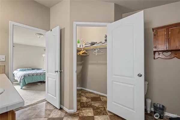 a bathroom with a sink double vanity and a mirror